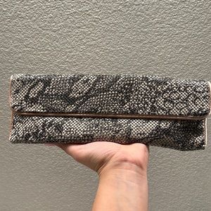 Snake skin print clutch with magnetic closure